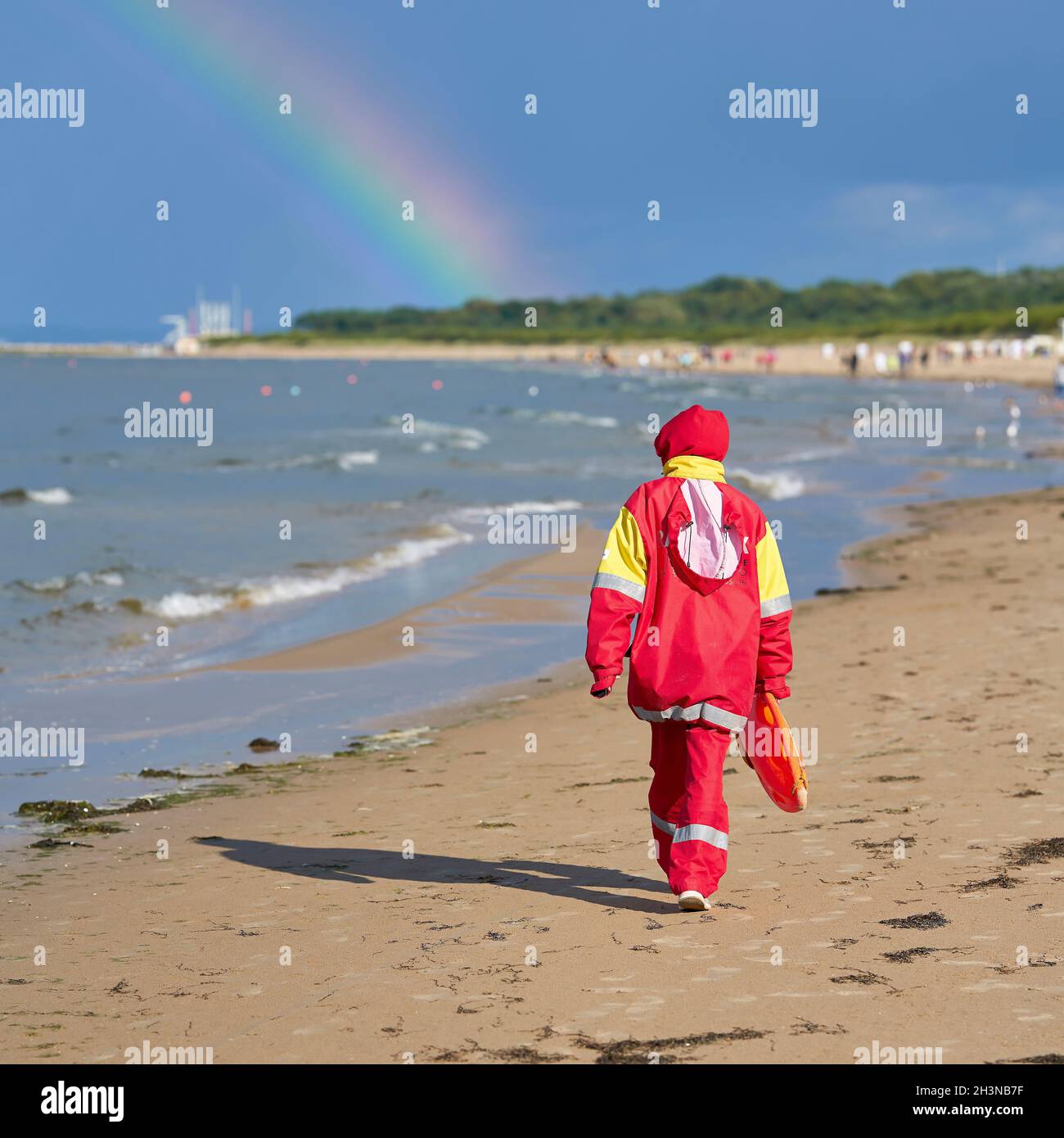 Lifeguard on the beach on the Polish Baltic coast near Swinoujscie goes home. Stock Photo