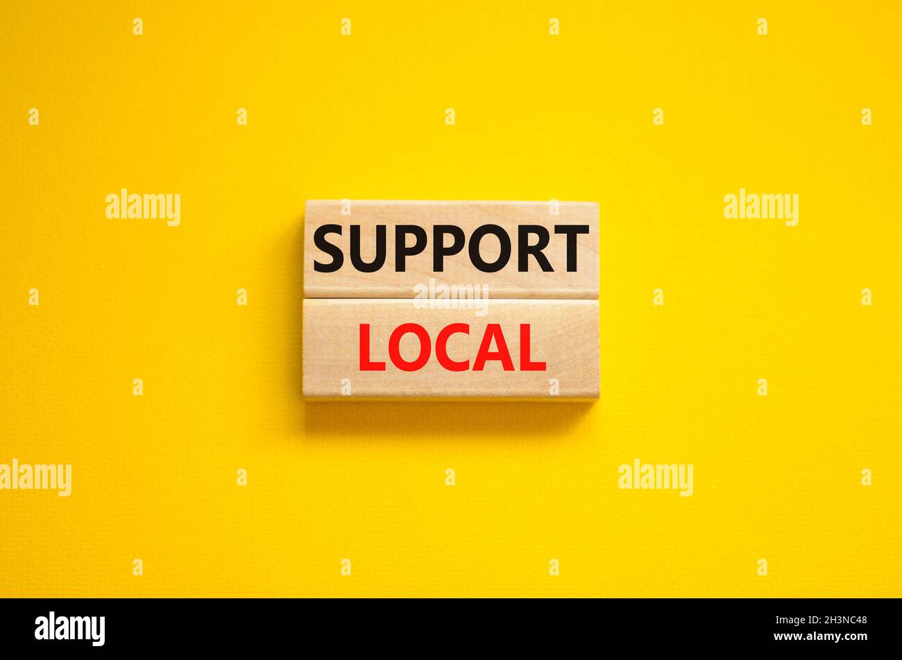 Time to support local symbol. Wooden blocks with words 'Support local ...