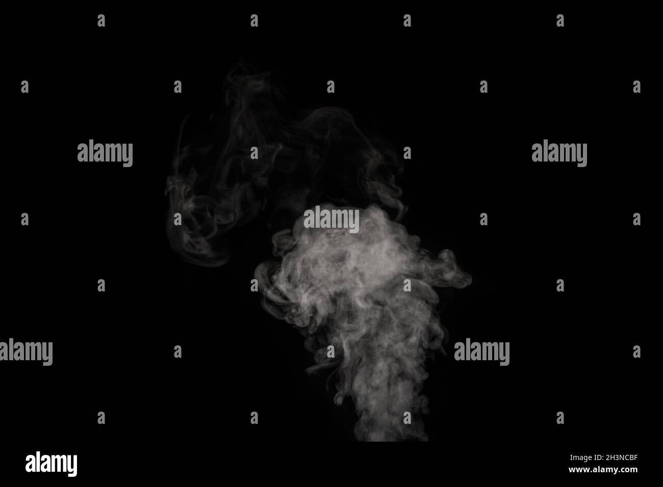 Blur white water vapour on isolated black background. Abstract of steam  with copy space. Steam flow. Smoke on white background. Stock Photo