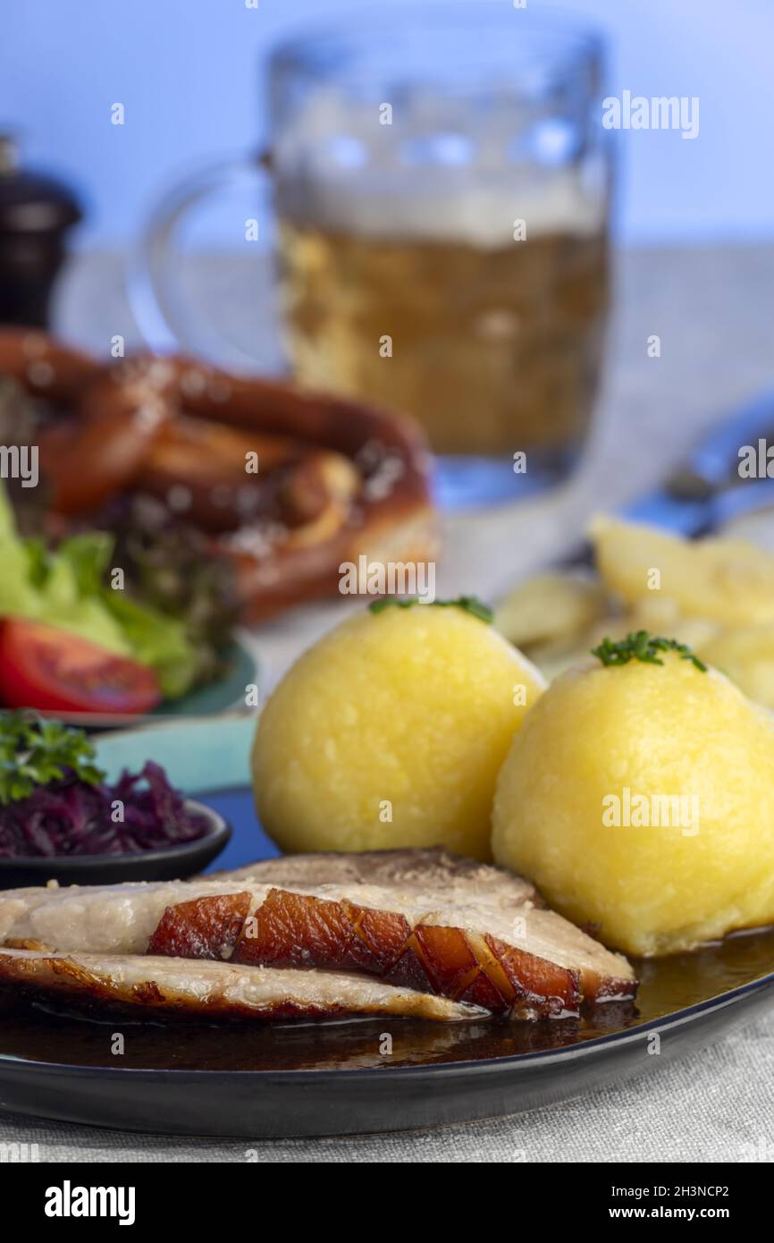 Bavarian roast pork with dumplings Stock Photo Alamy