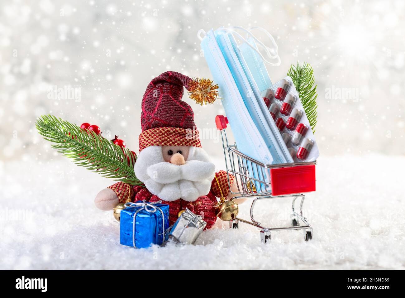 Christmas with Santa Claus coronavirus. Christmas composition. Stock Photo