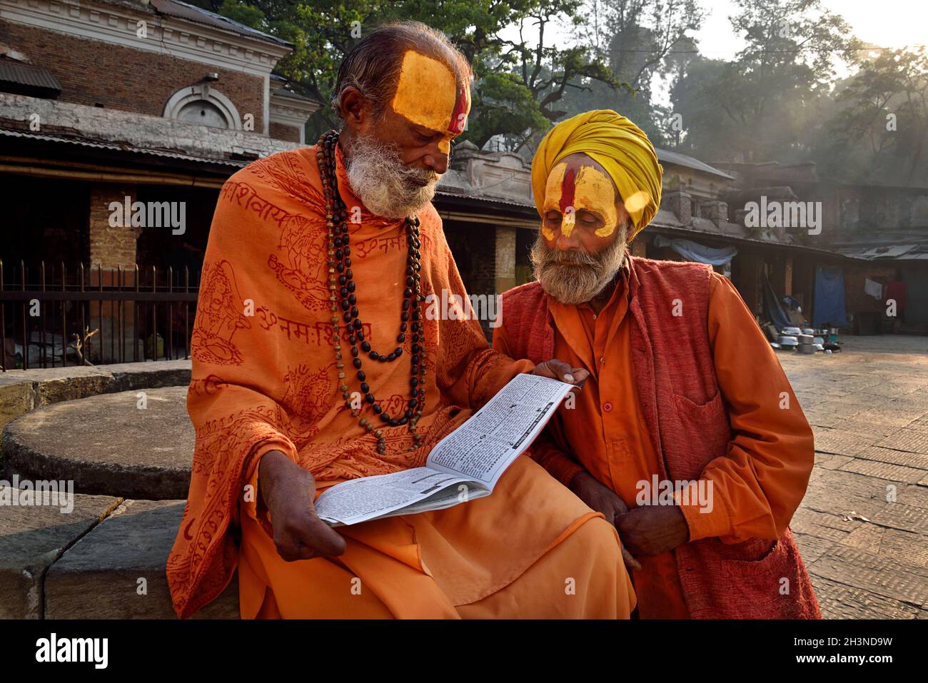 Kathmandu, Nepal April 10, 2016 Hindu sadhu babas in saffron color clothing in ancient