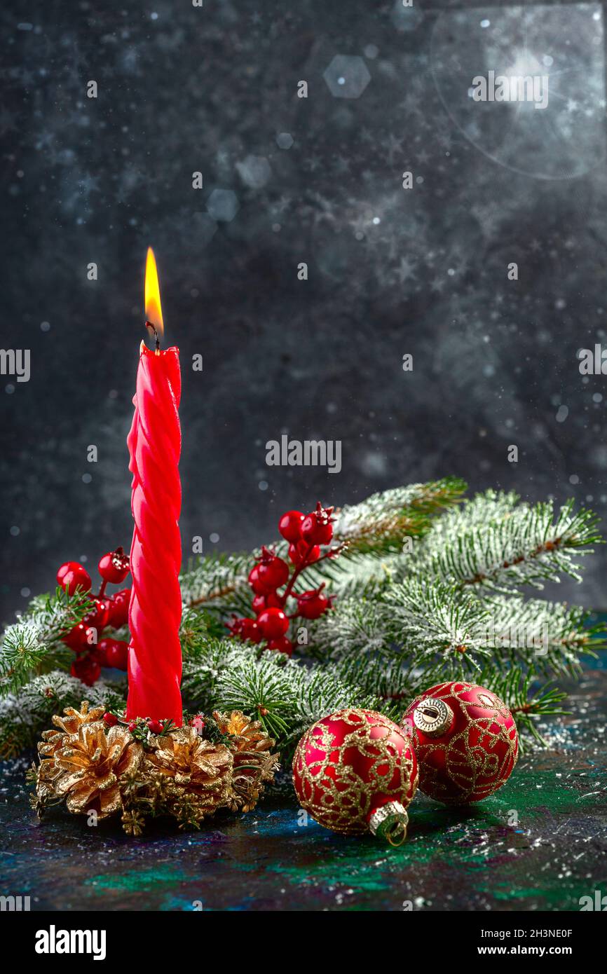 Christmas candle with fir branches. Stock Photo
