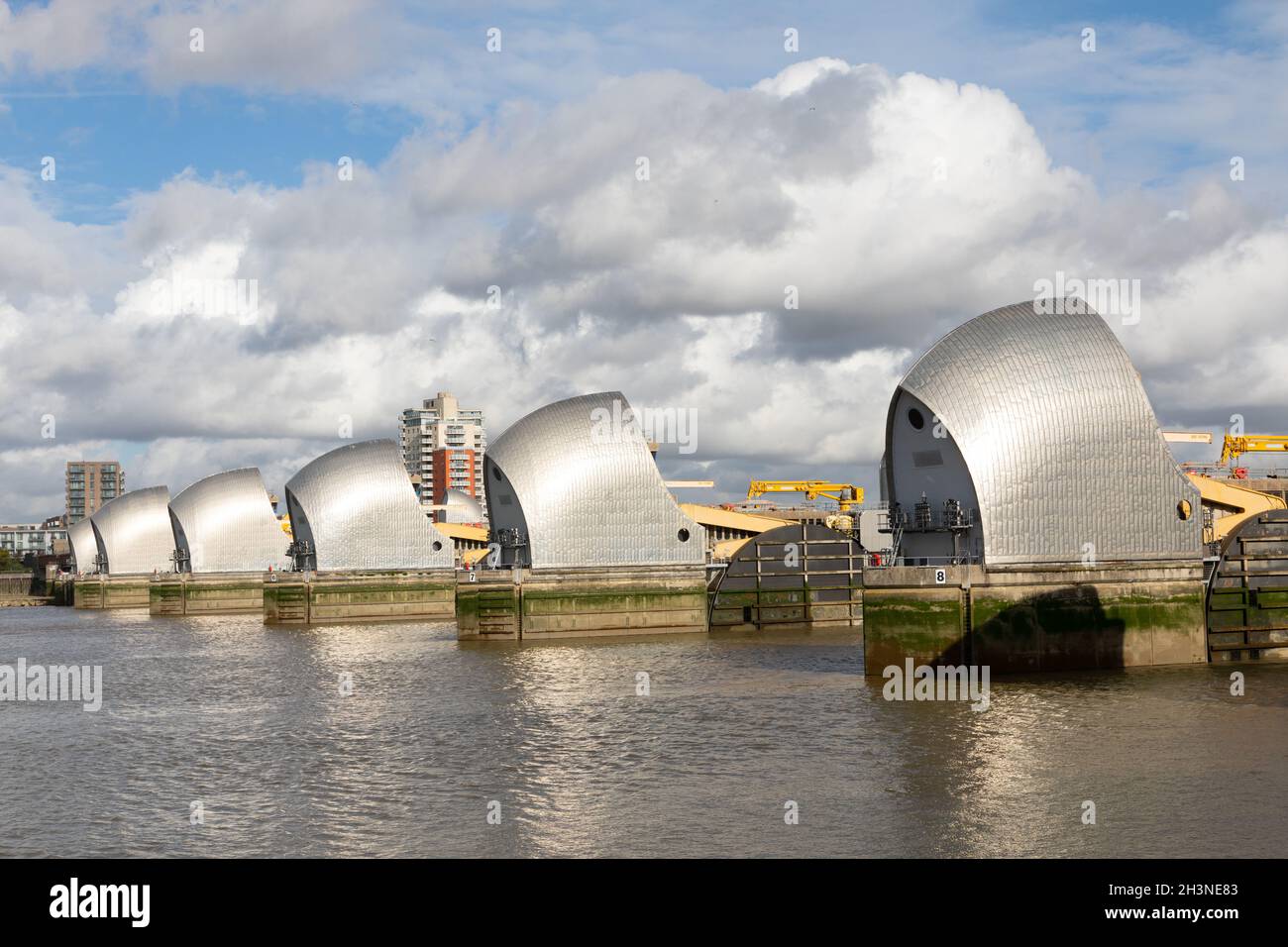 The Thames Barrier - part of London's flood defence system - designed to prevent London from being flooded by storm surges and exceptional tides. UK Stock Photo
