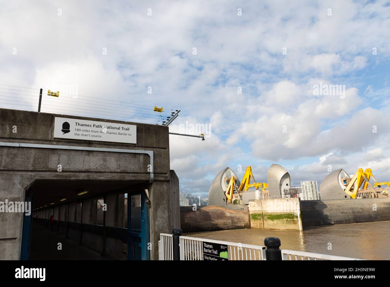 The  start of the Thames Path, a National Trail, at the Thames barrier, Greenwich, London, UK Stock Photo
