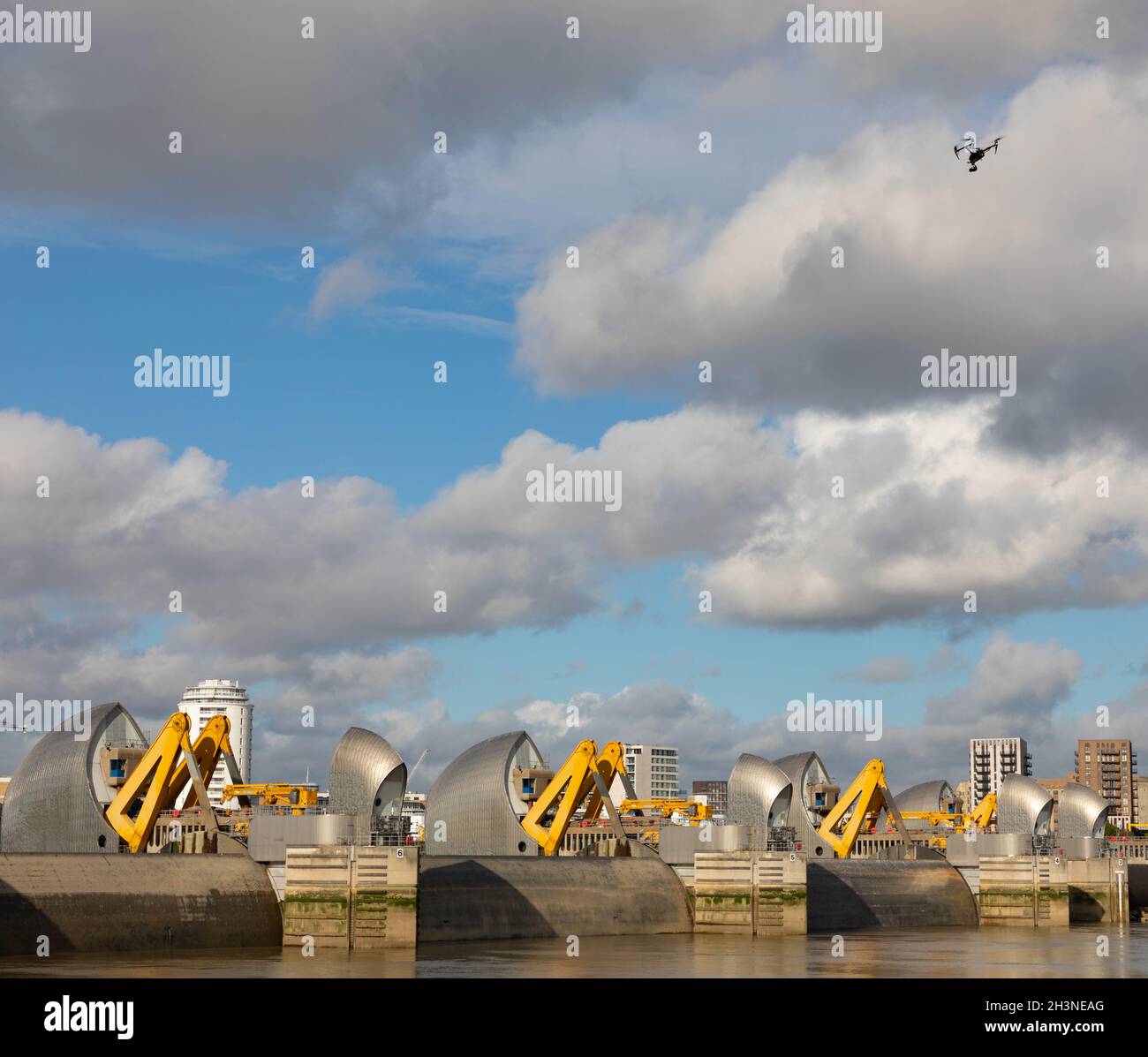 A drone filming at The Thames Barrier during a maintenance session. Stock Photo