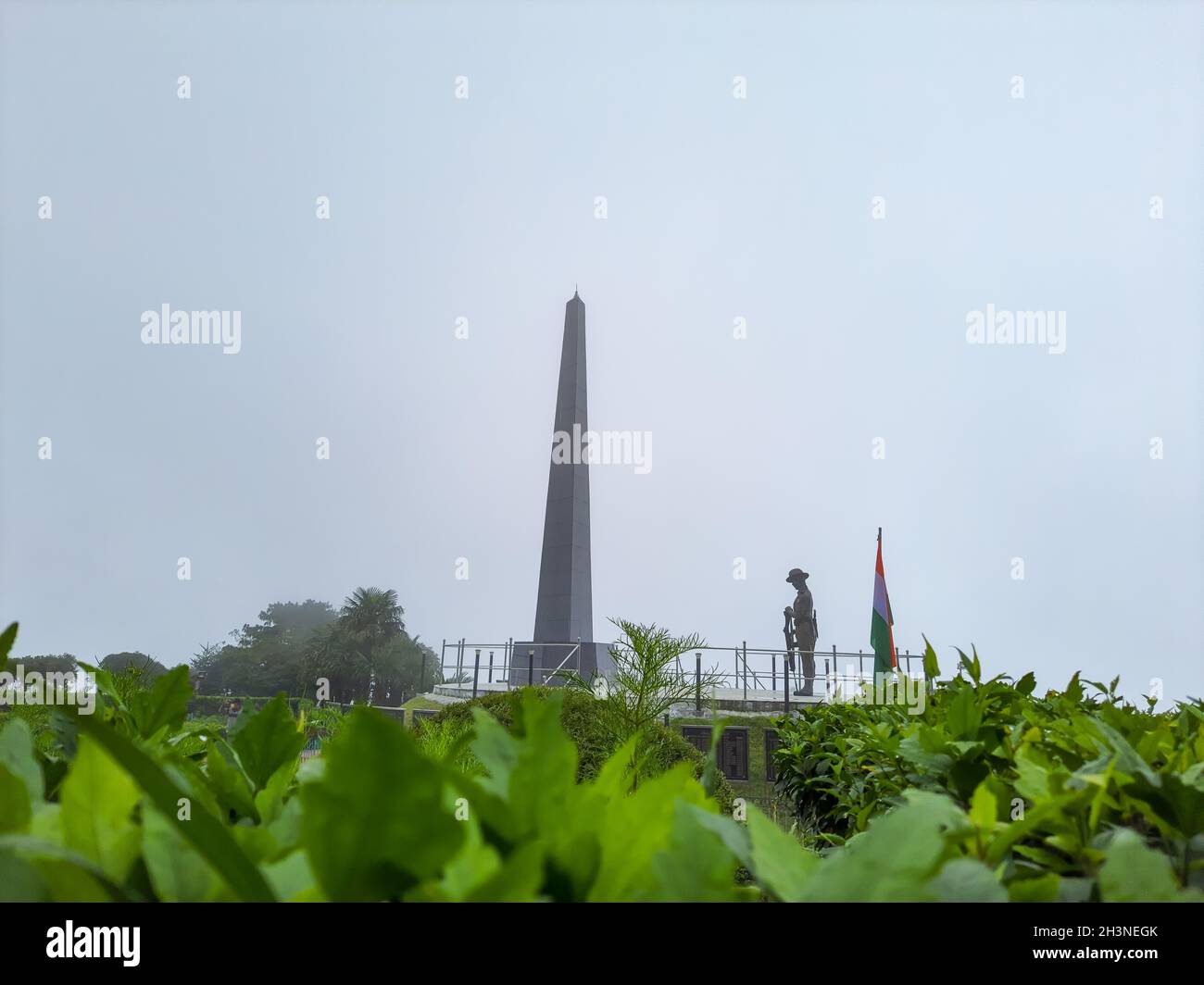 war memorial in the remembrance of brave soldiers at foggy day image is taken at batista loop darjeeling west bengal india. Stock Photo