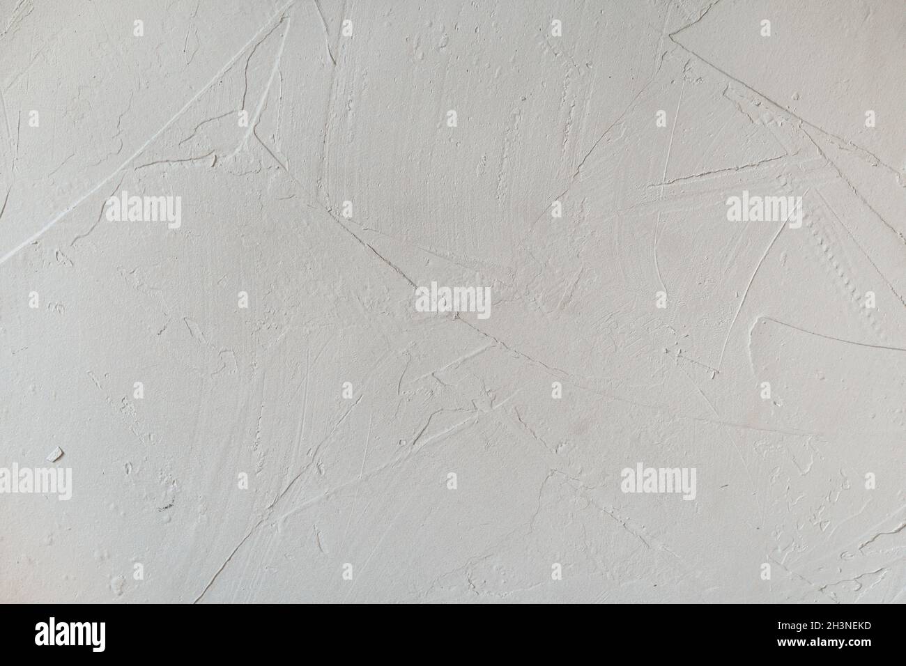 Rough uneven texture of plastered wall. Abstract background, empty blank or template with copy space Stock Photo