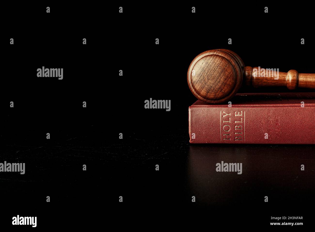 judge gavel with holy bible on black background Stock Photo Alamy