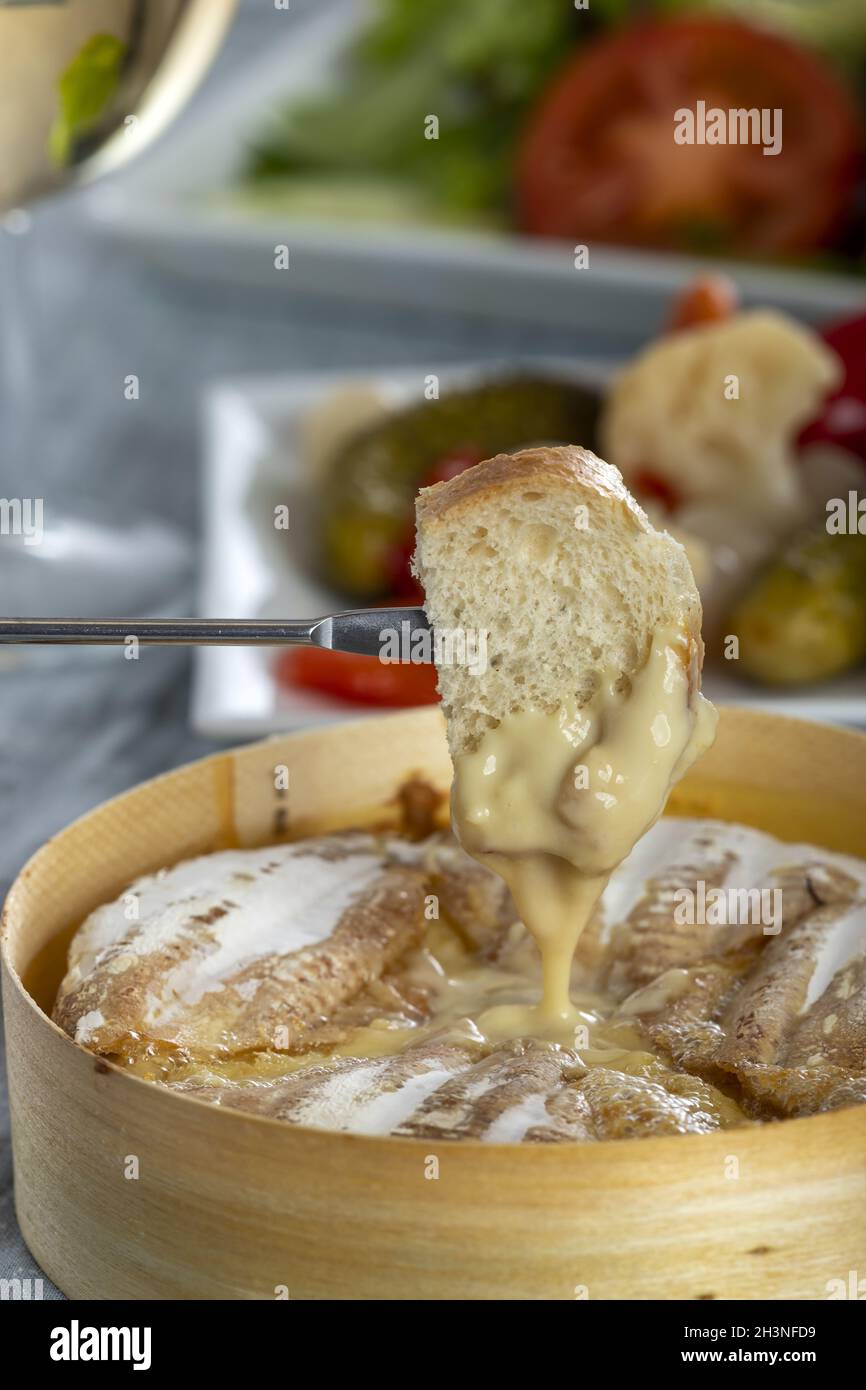 Swiss cheese fondue with bread Stock Photo Alamy