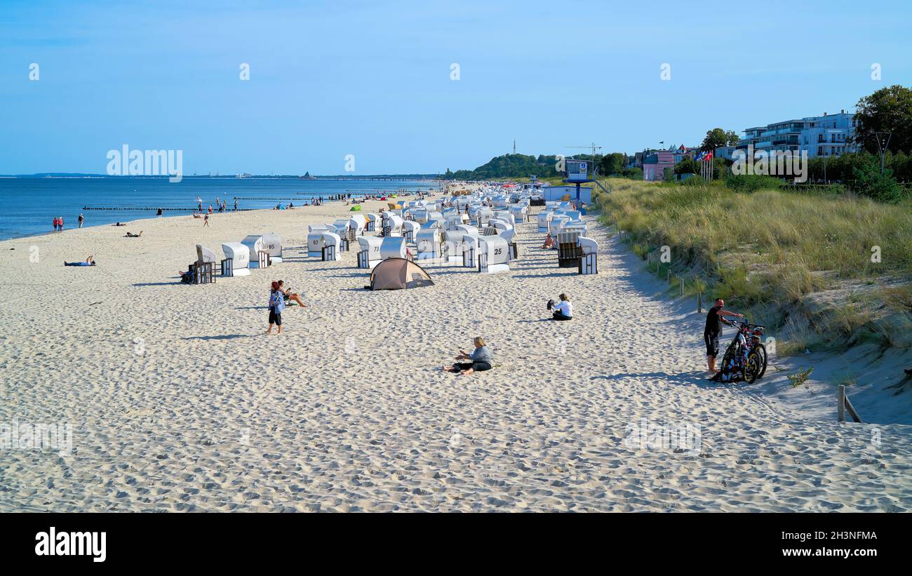 Beach with holiday makers in Bansin on the German Baltic coast on the island of Usedom Stock Photo
