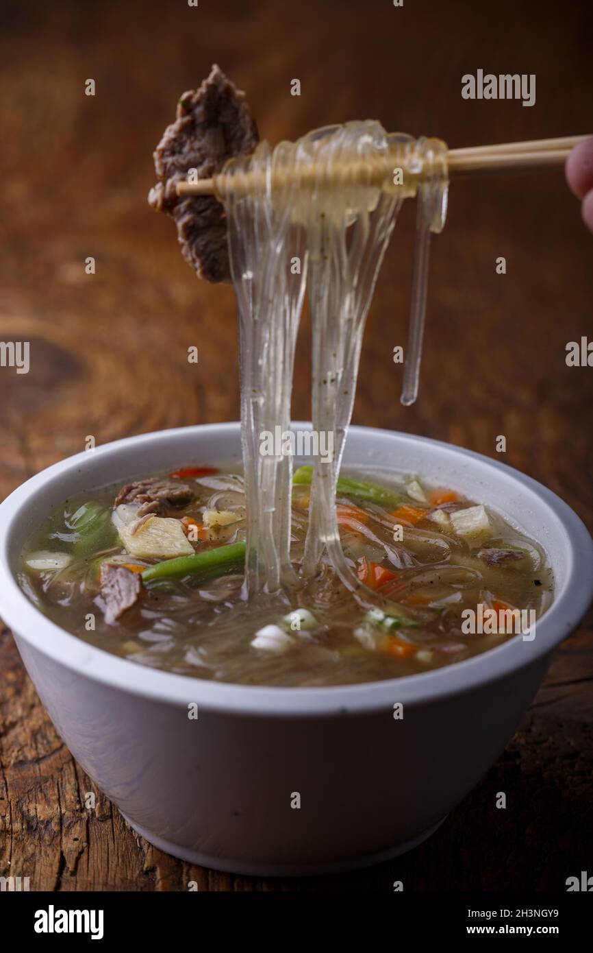 Asian glass noodle soup on wood Stock Photo Alamy