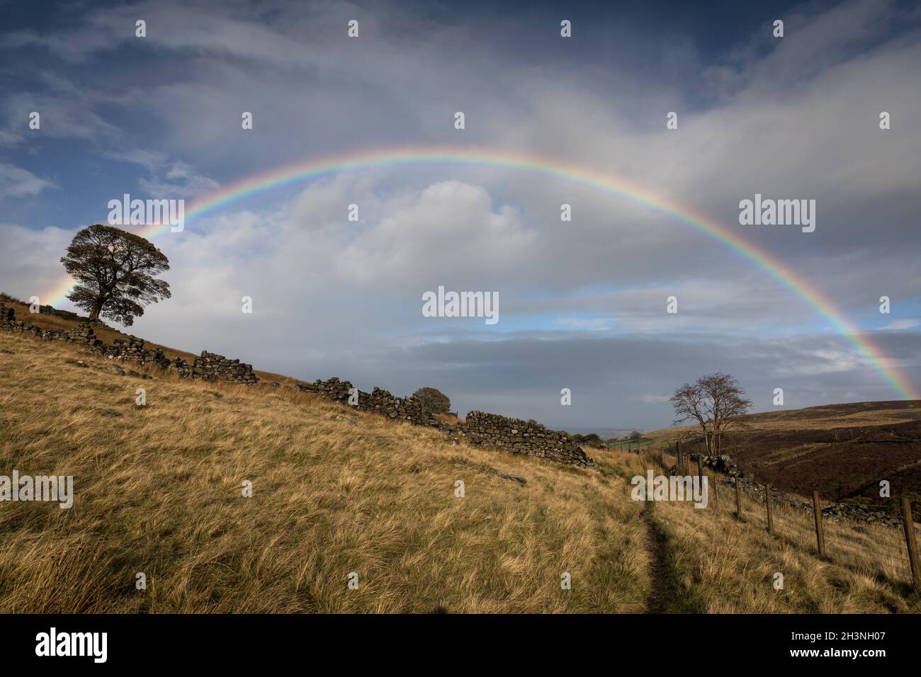 A rainbow over the Brontë moors in West Yorkshire Stock Photo