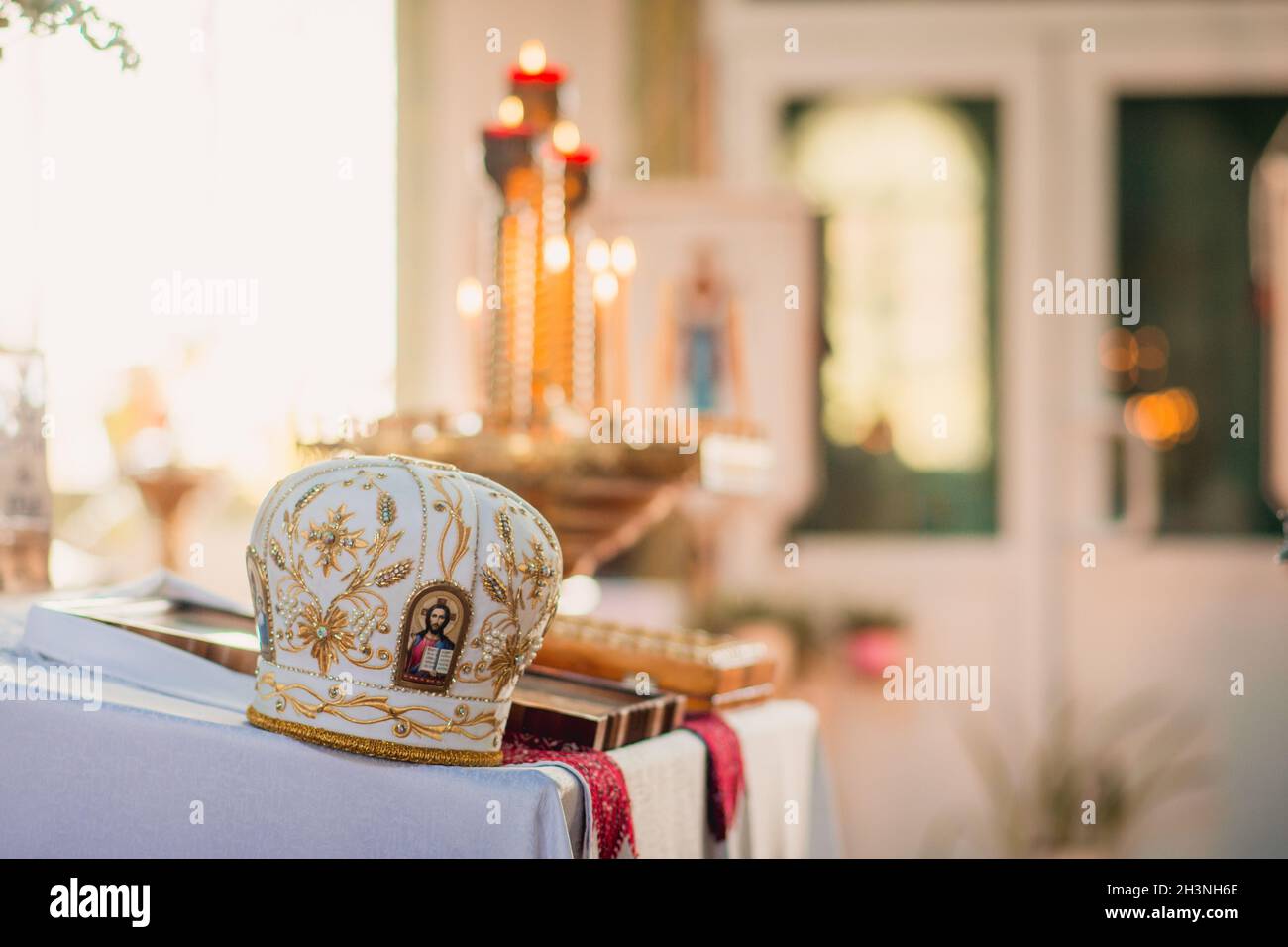 Priest's headdress on the table in the Orthodox Church with an icon Stock Photo