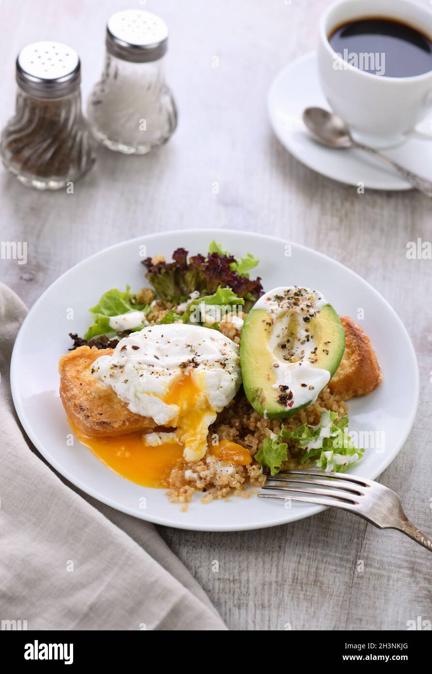 A healthy and balanced breakfast plate. Benedict's egg spreads on a