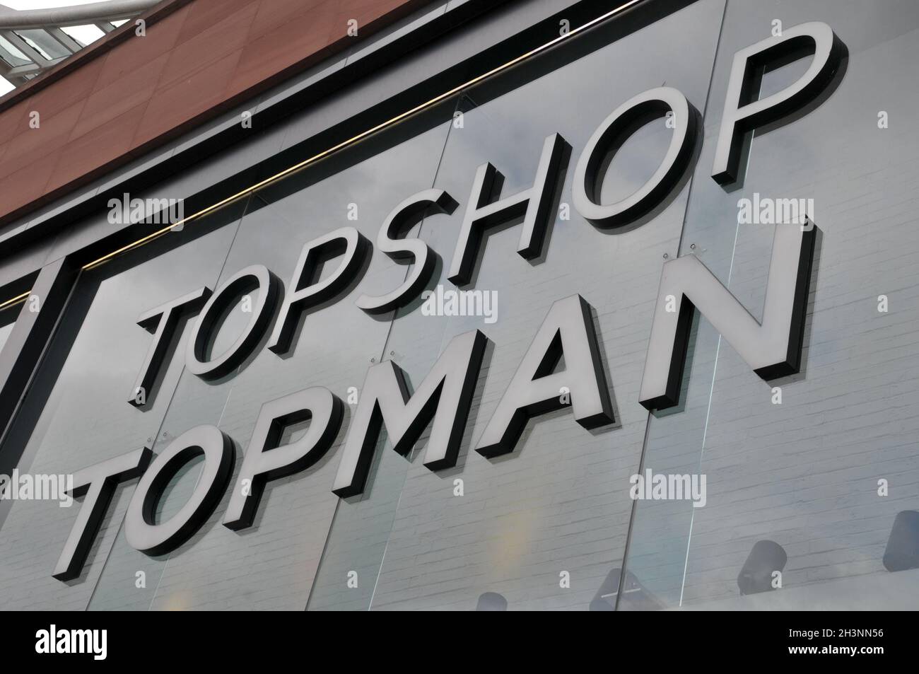 Sign on the topshop and topman building building in Briggate in the centre  of Leeds Stock Photo - Alamy