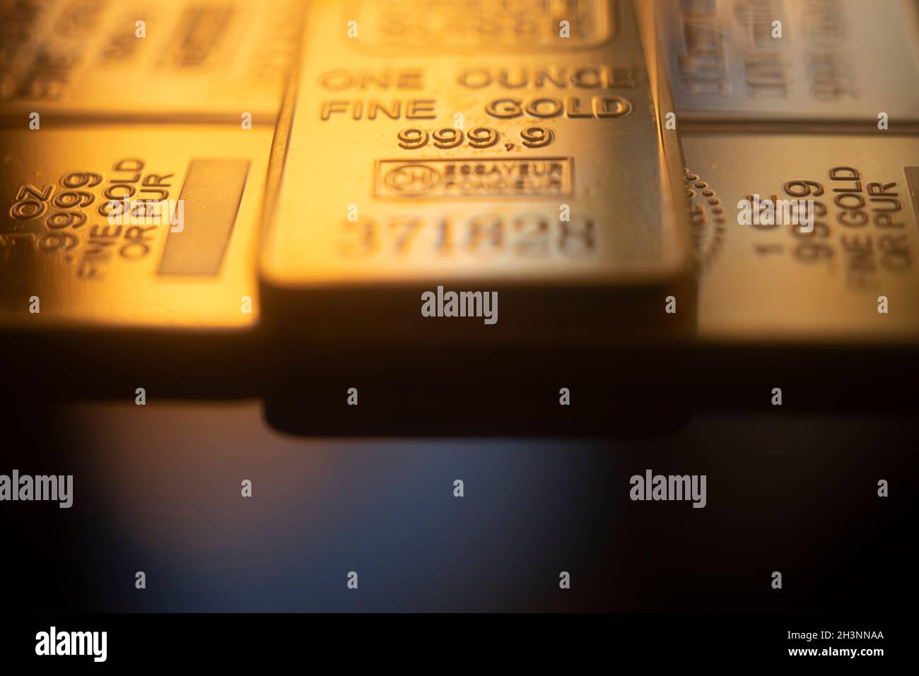 Solid pure 999.9 gold bullion ingot bars photo. Stock Photo