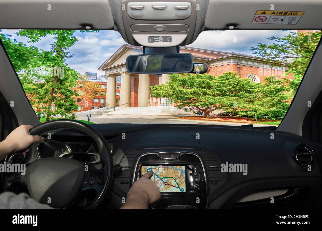 Driving a car while using the touch screen of a GPS navigation system
