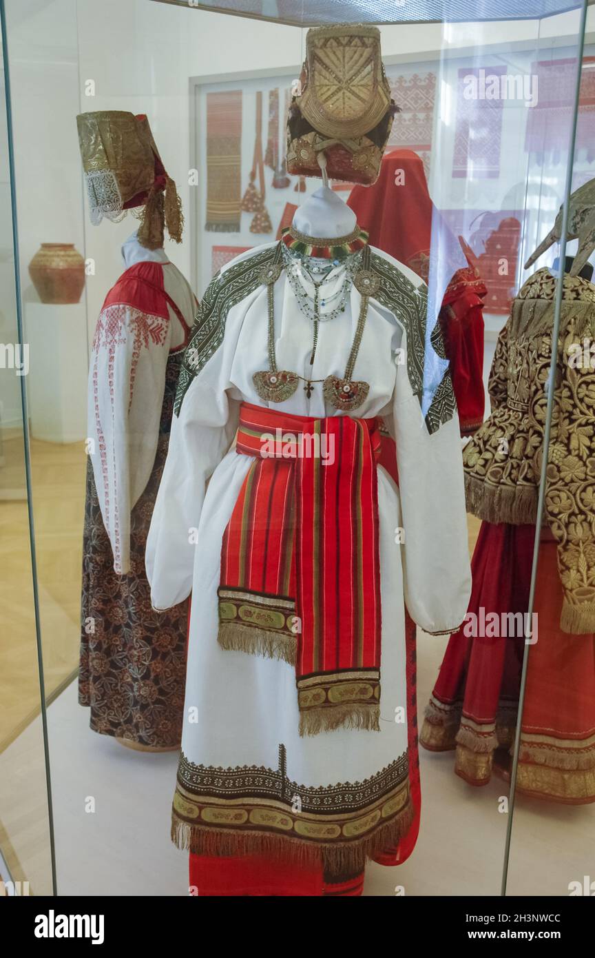 Russian national costume is a woman's suit. Clothes of the peoples of Russia. Stock Photo