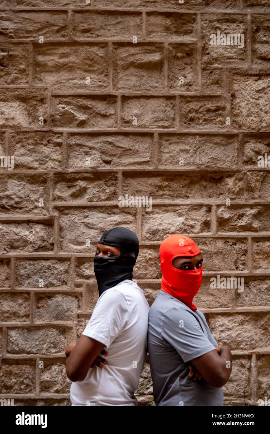 Two afro young men in ski masks in alleyway Stock Photo Alamy