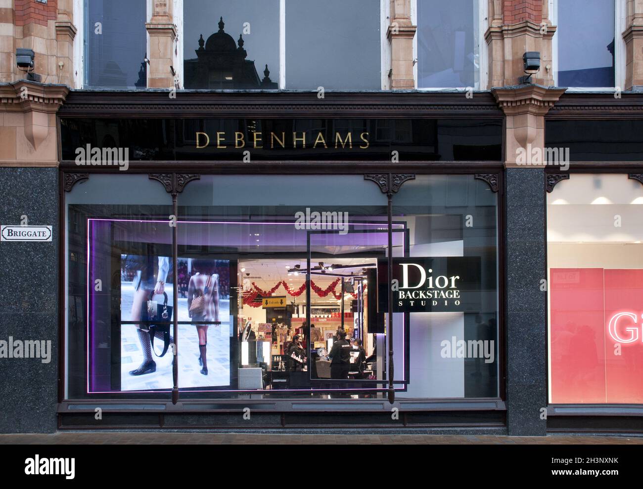 Display of fashion advertising in debenhams department store window in Kirkgate leeds Stock Photo