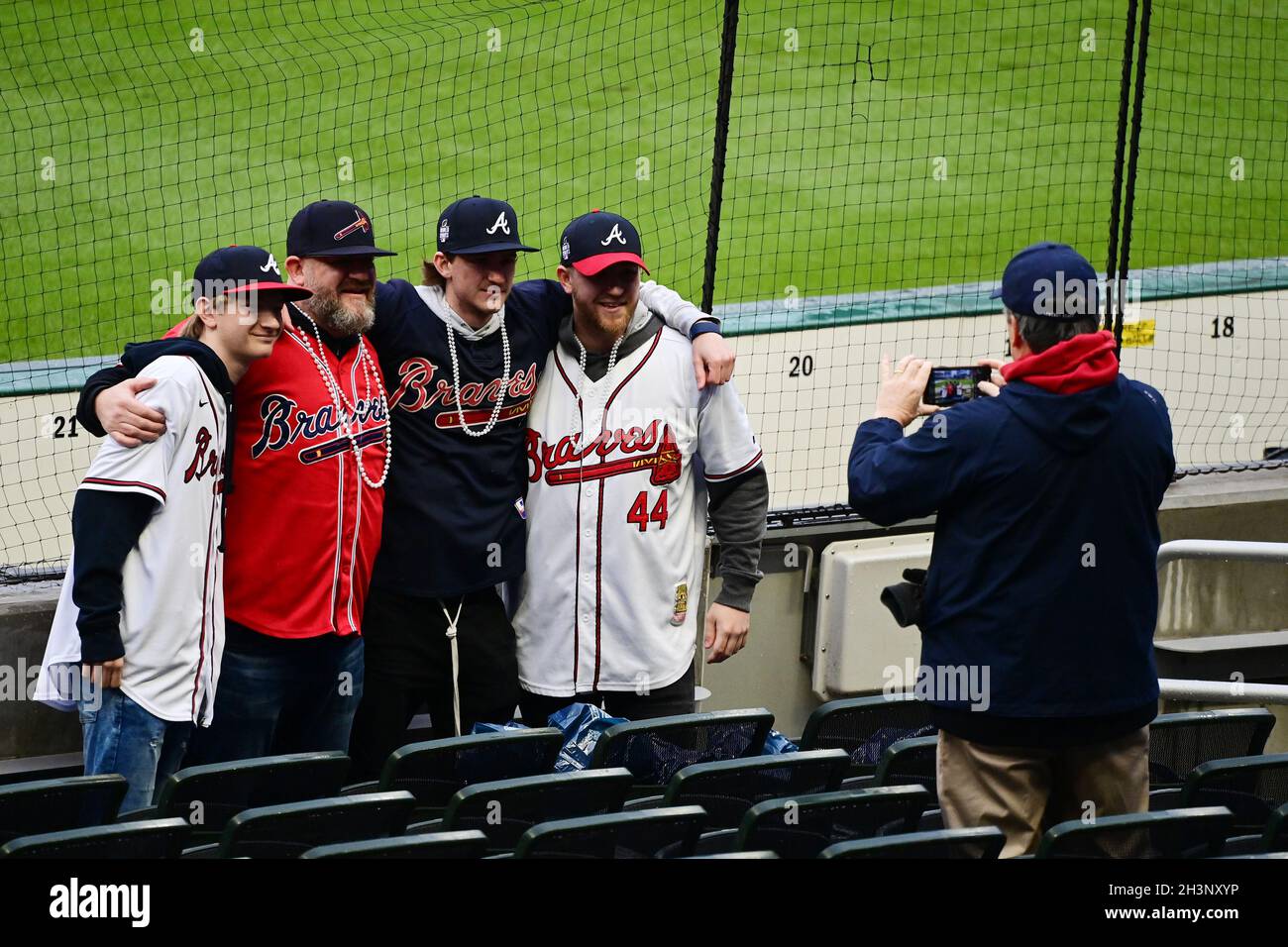 Atlanta, USA. 29th Oct, 2021. Atlanta Braves fans wearing pearl necklaces  in the style of Braves right fielder Joc Pederson before the start of game  three of the MLB World Series against