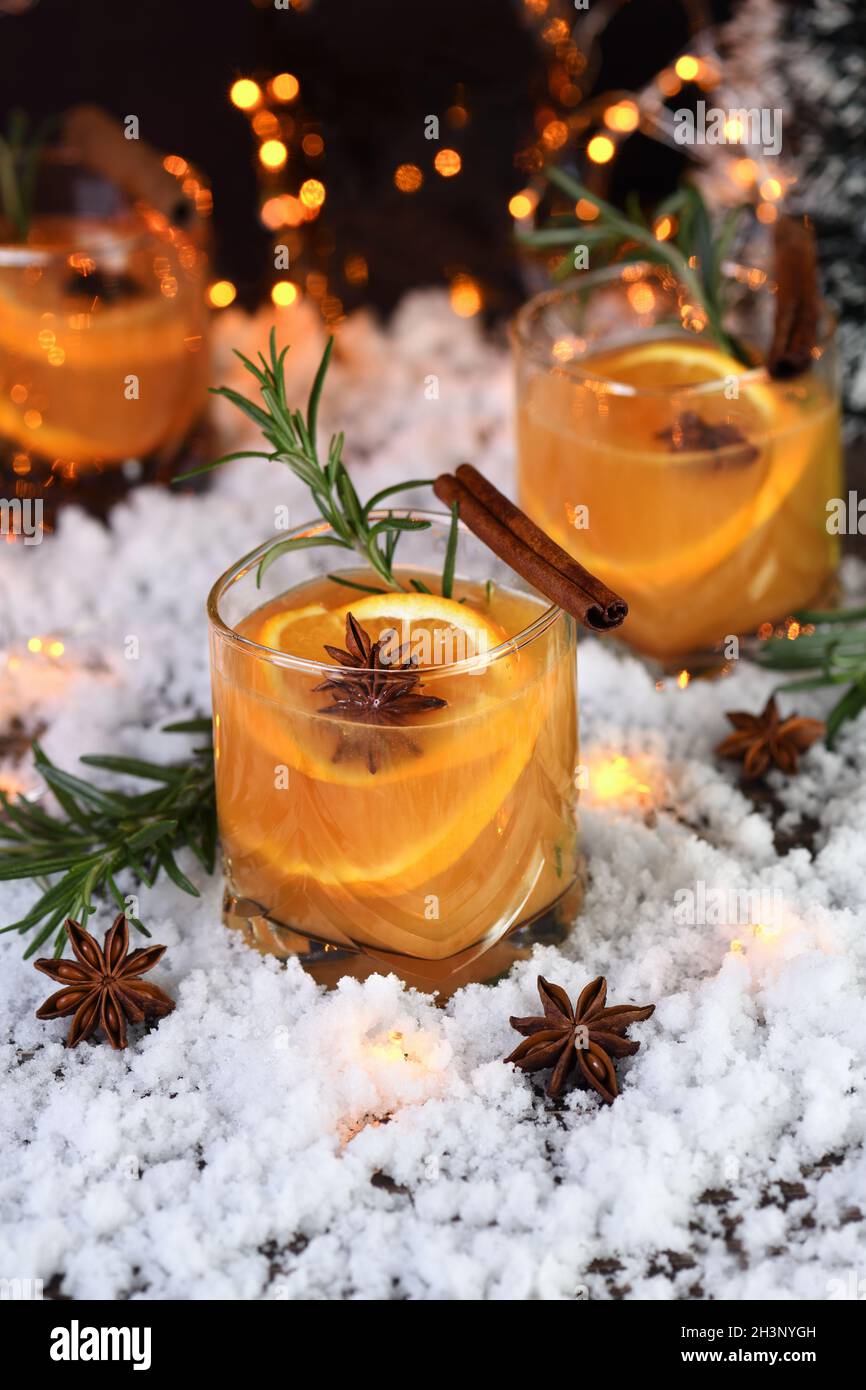 Negroni cocktail. Bourbon with cinnamon with oranges juice and star