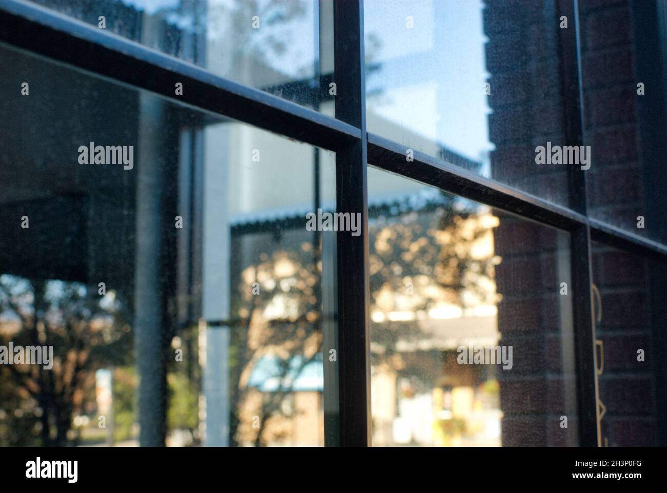 Detail of a true divided light window. Stock Photo