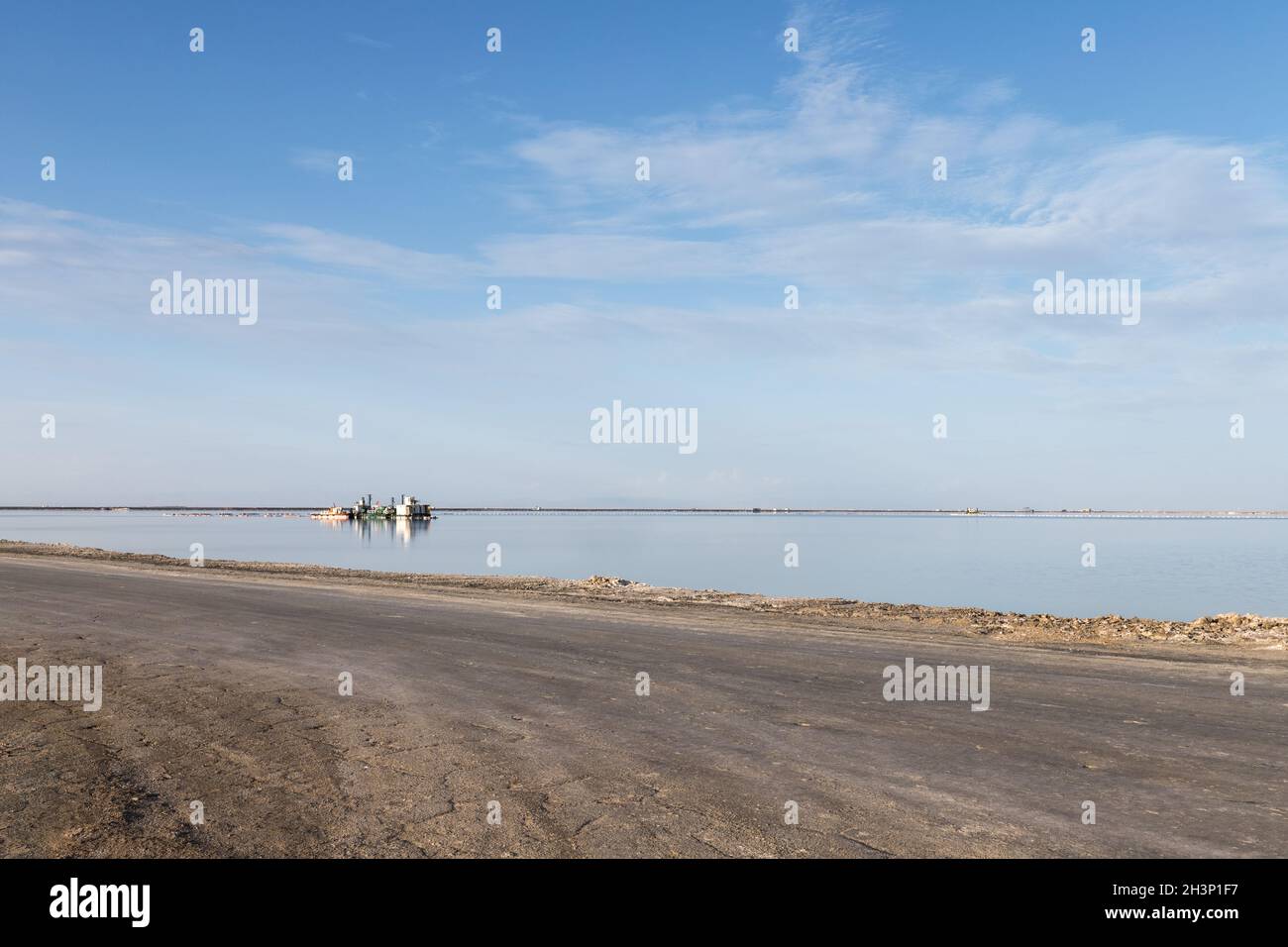 Simple road and salt lake industrial landscape Stock Photo