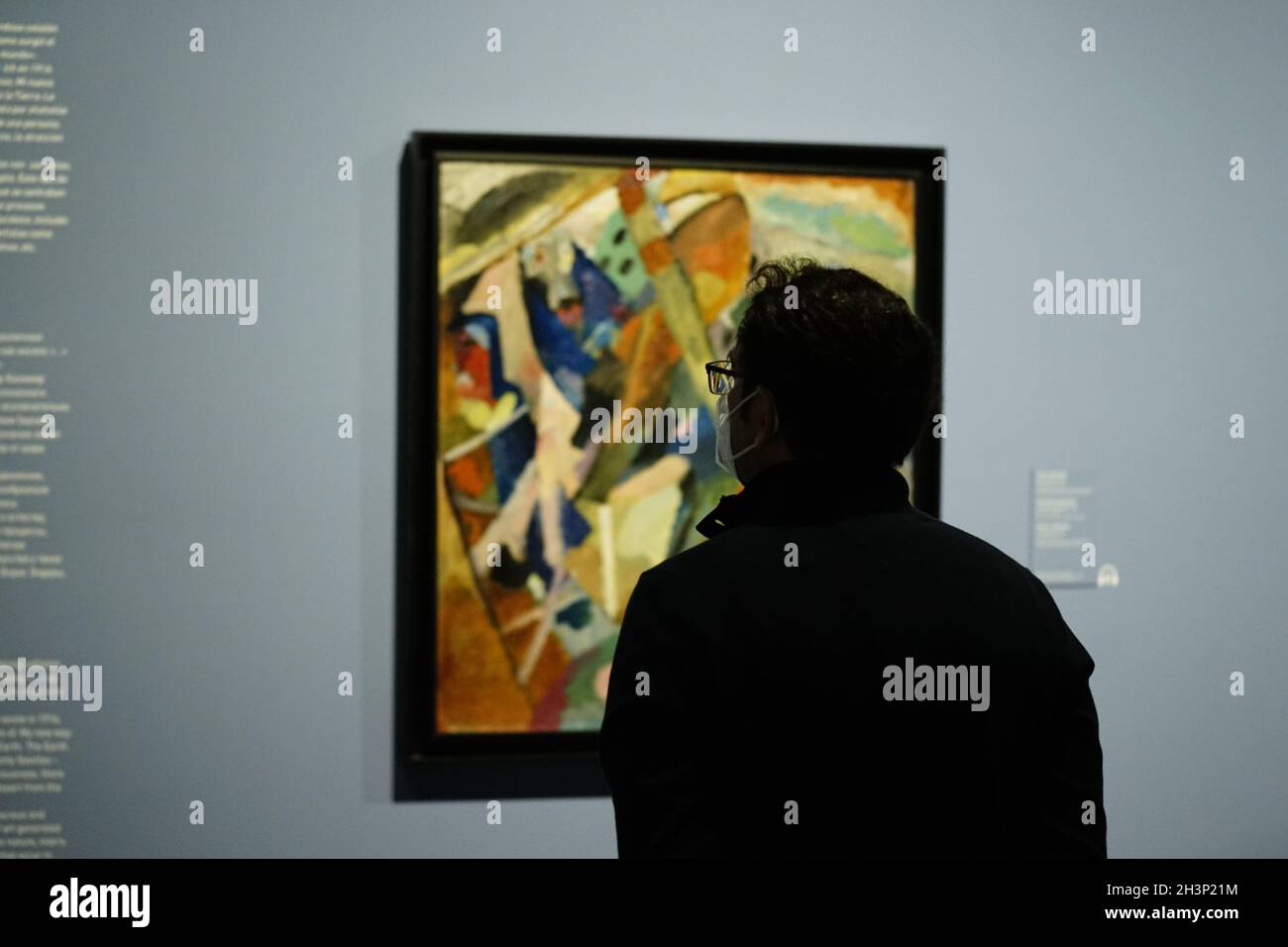 Malaga, Spain. 29th Oct, 2021. A guest observes an art piece during the inauguration of three temporary exhibitions; Vanguardias en el arte ruso', 'Maiakovski, artista y poeta' and 'Dostoievski en su bicentenario'; at Coleccion del Museo Ruso. (Photo by Francis Gonzalez/SOPA Images/Sipa USA) Credit: Sipa USA/Alamy Live News Stock Photo