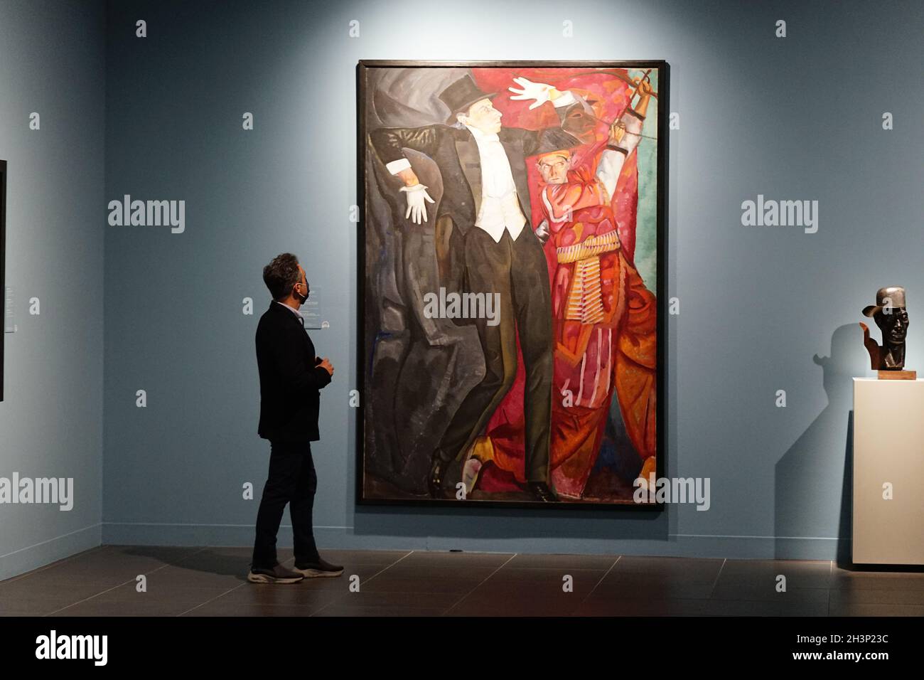 Malaga, Spain. 29th Oct, 2021. A guest observes an art piece during the inauguration of three temporary exhibitions; Vanguardias en el arte ruso', 'Maiakovski, artista y poeta' and 'Dostoievski en su bicentenario'; at Coleccion del Museo Ruso. (Photo by Francis Gonzalez/SOPA Images/Sipa USA) Credit: Sipa USA/Alamy Live News Stock Photo