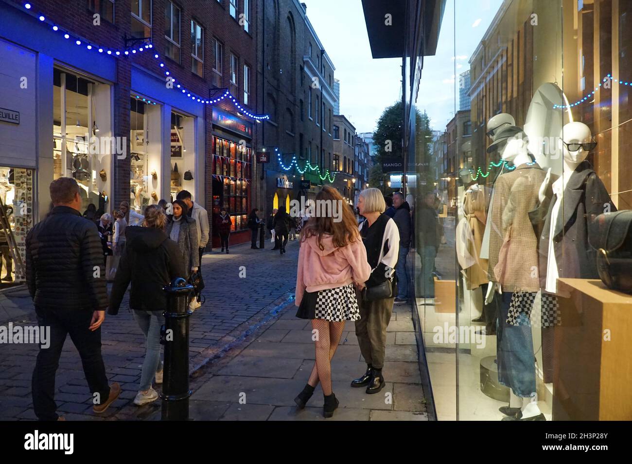 London, UK, 29 October 2021 As dusk falls in Covent Garden and the surrounding cobbled streets