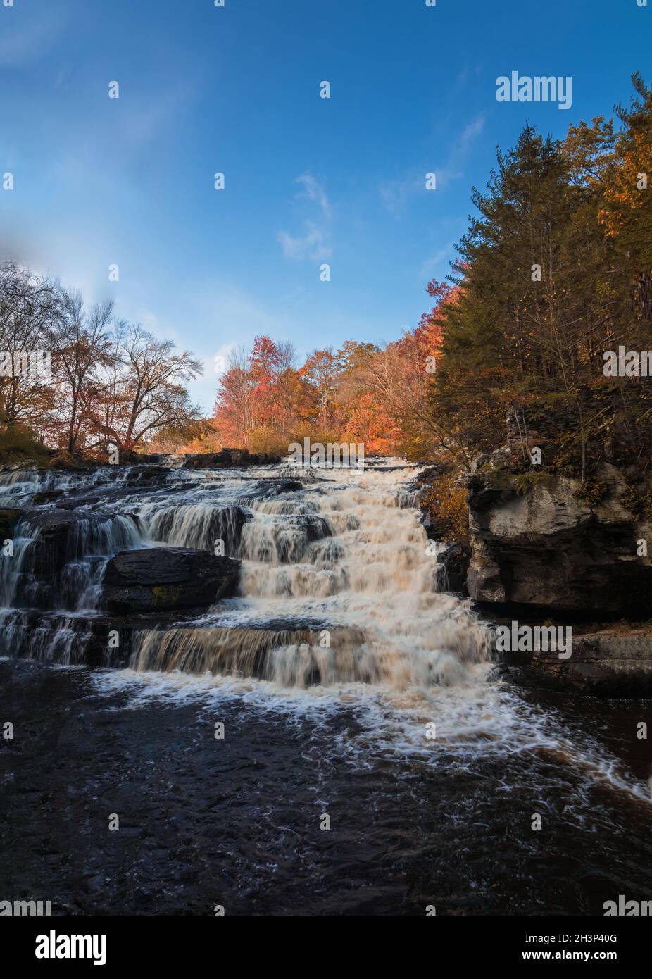 Shohola Falls in the Pennsylvania Poconos on a beautiful fall morning surrounded by peak fall