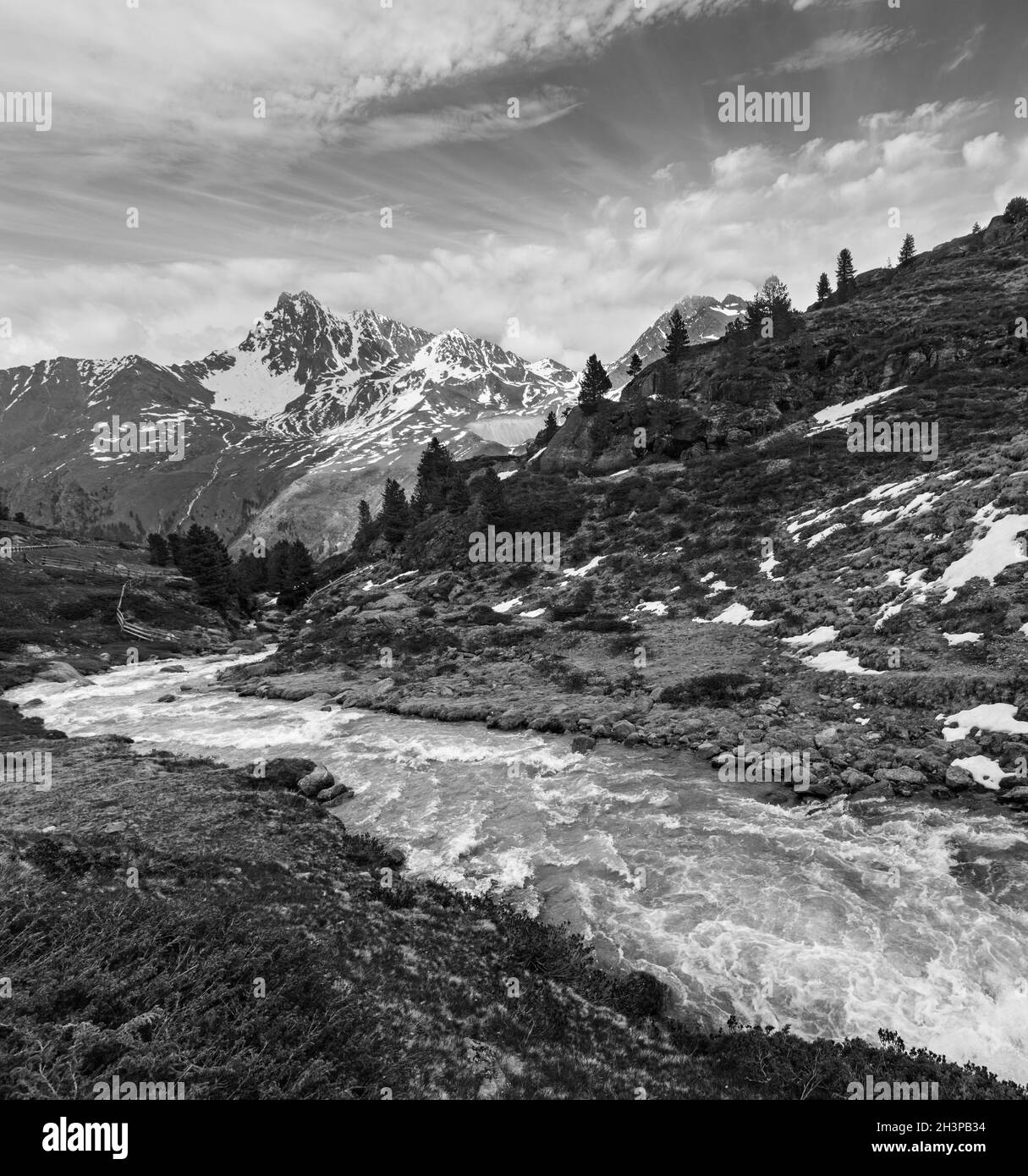 Grayscale. Summer Alps mountain stream on way to Kaunertal Gletscher Stock Photo