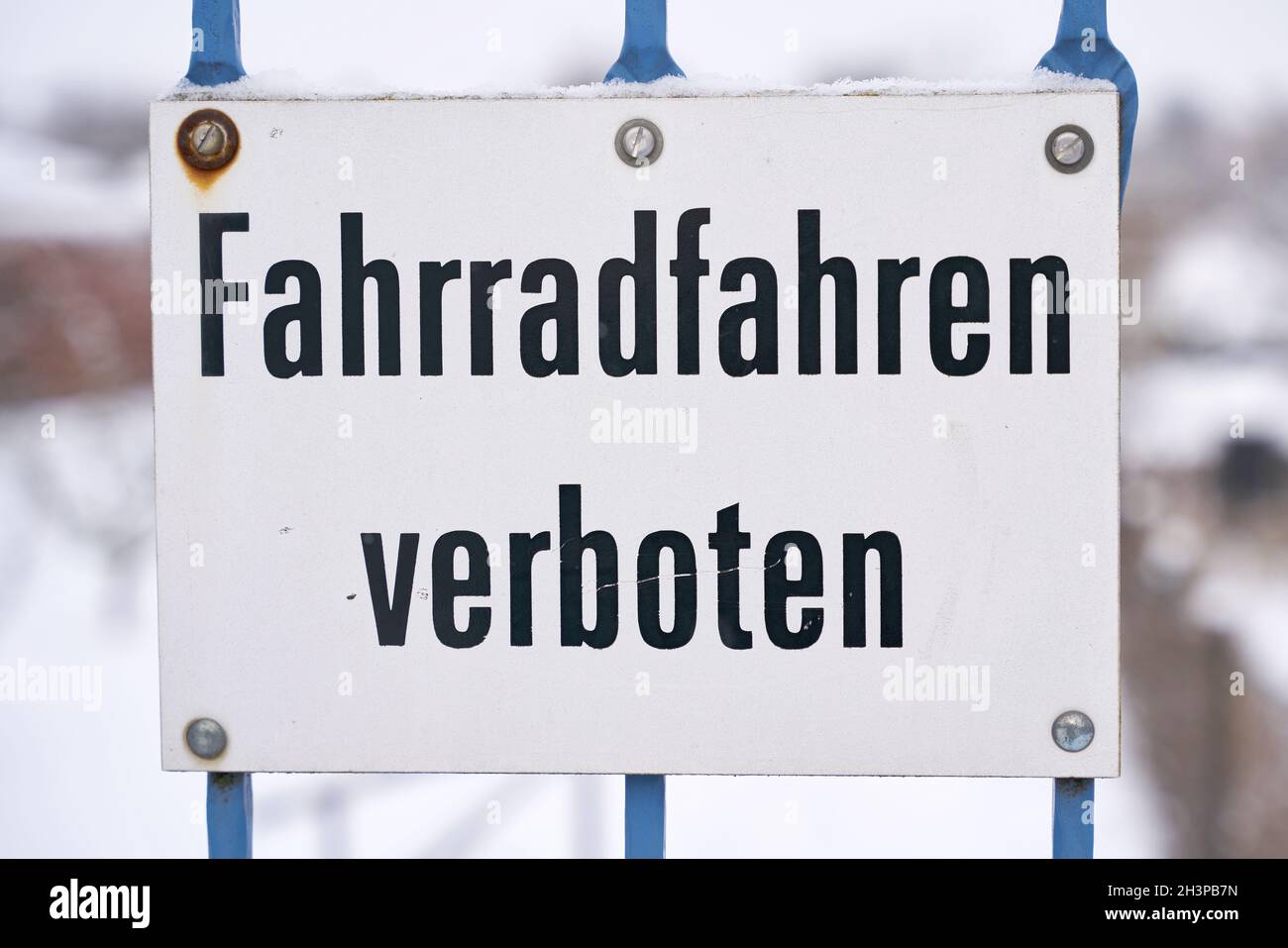 Sign at the beginning of a footpath with the inscription Bicycling prohibited Stock Photo