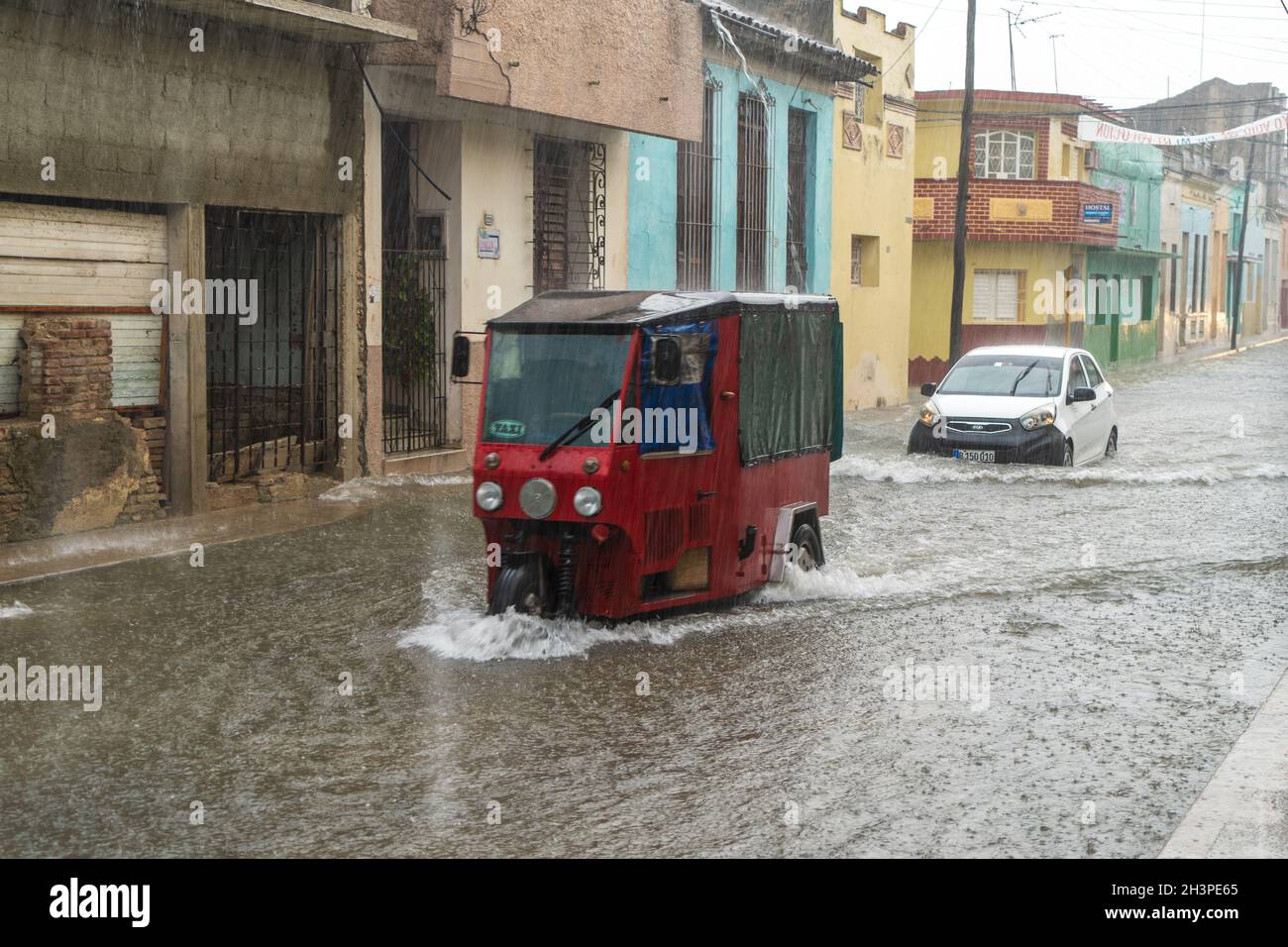 Street flooded by rainwater Stock Photo - Alamy