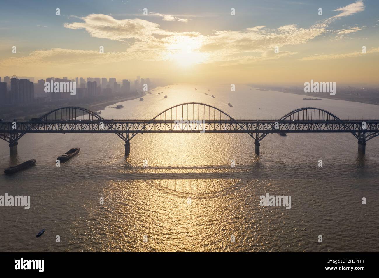 Jiujiang yangtze river bridge at dusk Stock Photo