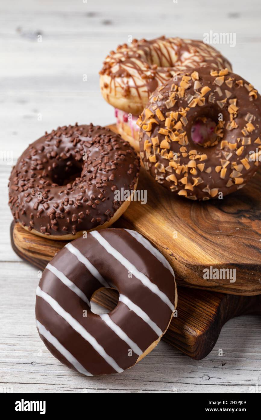 Donuts on a wooden background Stock Photo