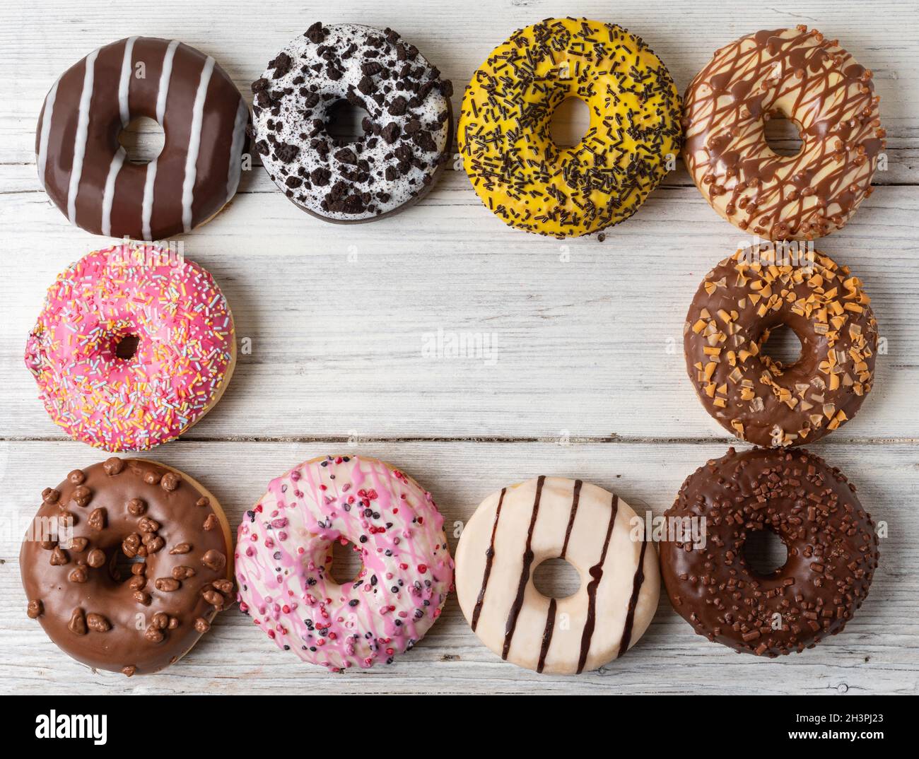 Donuts on a wooden background Stock Photo