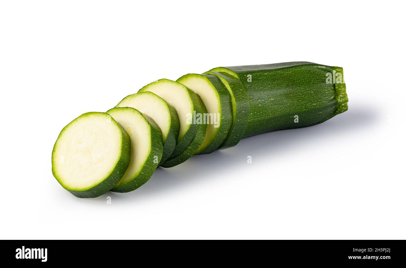 Fresh green zucchini slices on white background Stock Photo