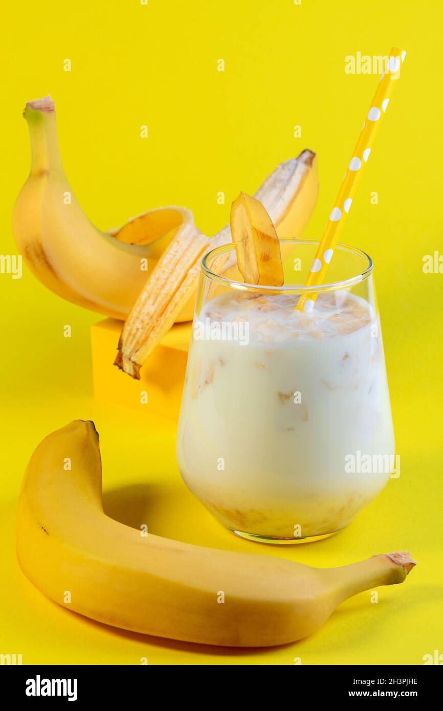 Healthy banana drink with oatmeal milk. Stock Photo