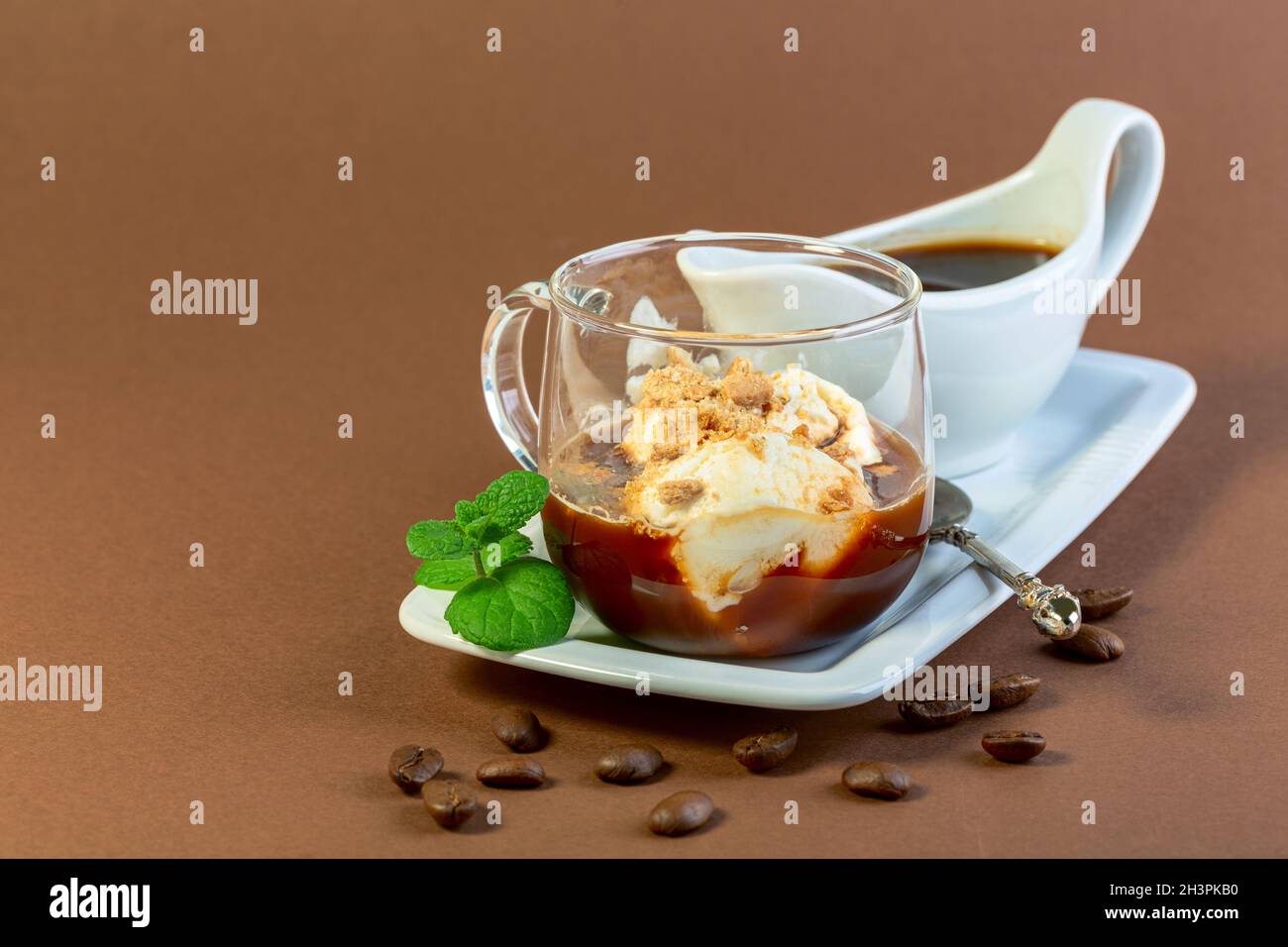 Affogato (Italian for drowned) is an Italian coffee dessert Stock Photo