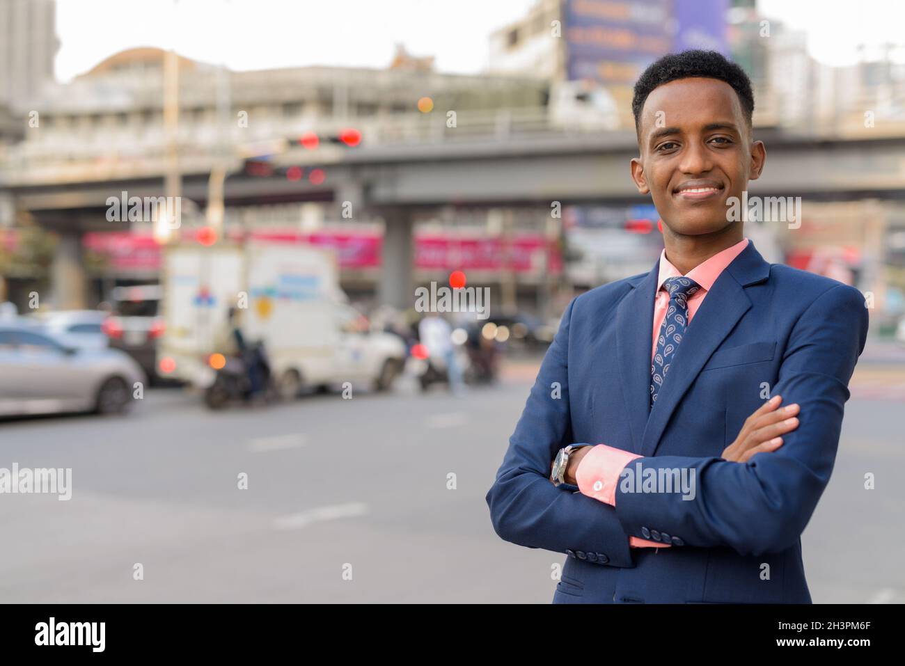 Portrait of young African businessman wearing suit and tie Stock Photo ...