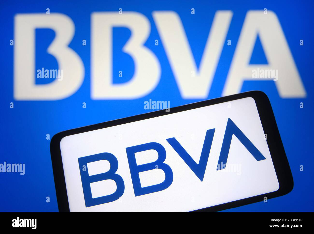 Ukraine. 29th Oct, 2021. In this photo illustration, BBVA (Banco Bilbao Vizcaya Argentaria, S.A.) logo is seen displayed on a smartphone and a pc screen. (Photo by Pavlo Gonchar/SOPA Images/Sipa USA) Credit: Sipa USA/Alamy Live News Stock Photo