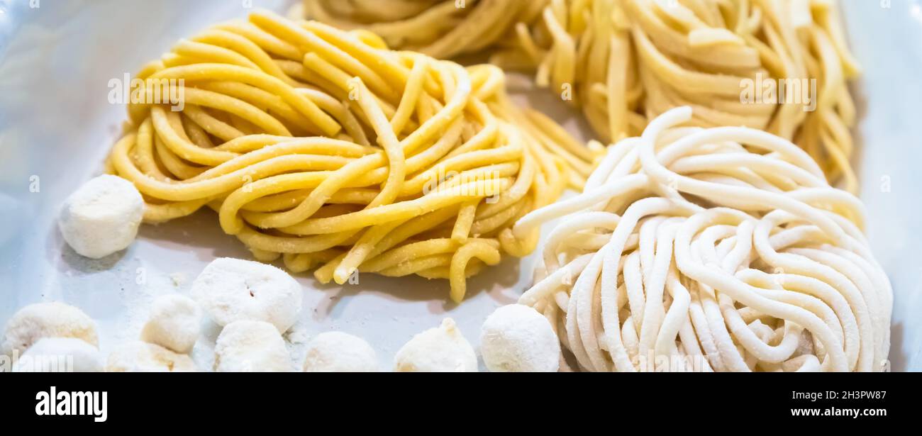 Traditional Italian cuisine. Preparation of Bucatini pasta in Rome