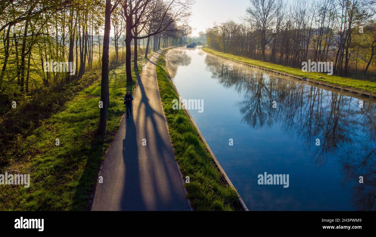 Natural Stream Canals Aerial view of an Idillic river stream canal with grass banks and wild ...