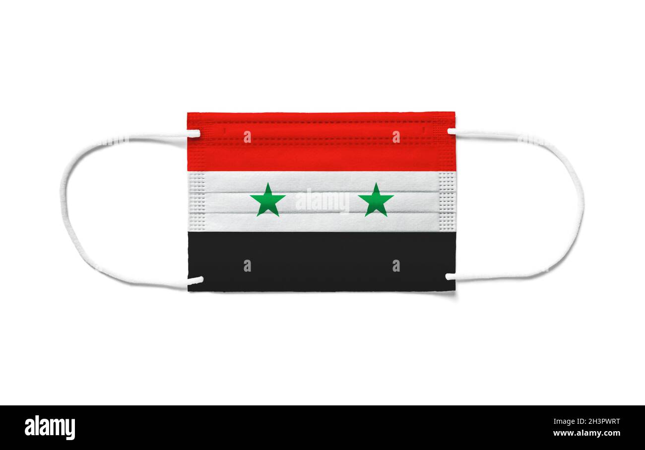 Flag of Syria on a disposable surgical mask. White background Stock Photo