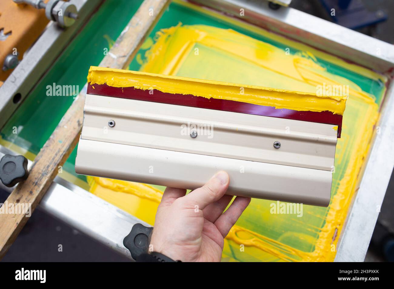 Squeegee for Serigraphy silk screen print process at clothes factory