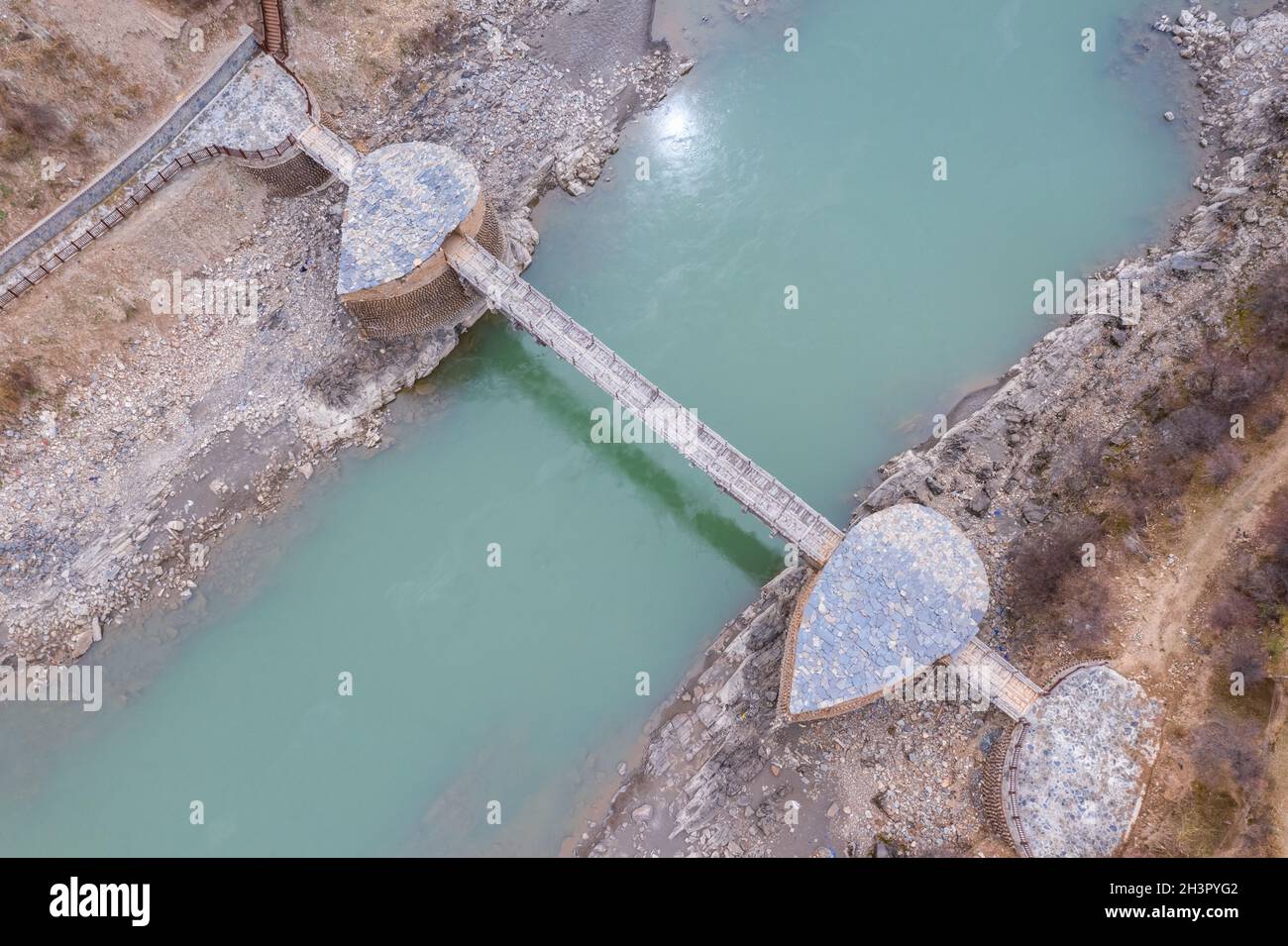 Aerial view of wooden overhanging bridge Stock Photo