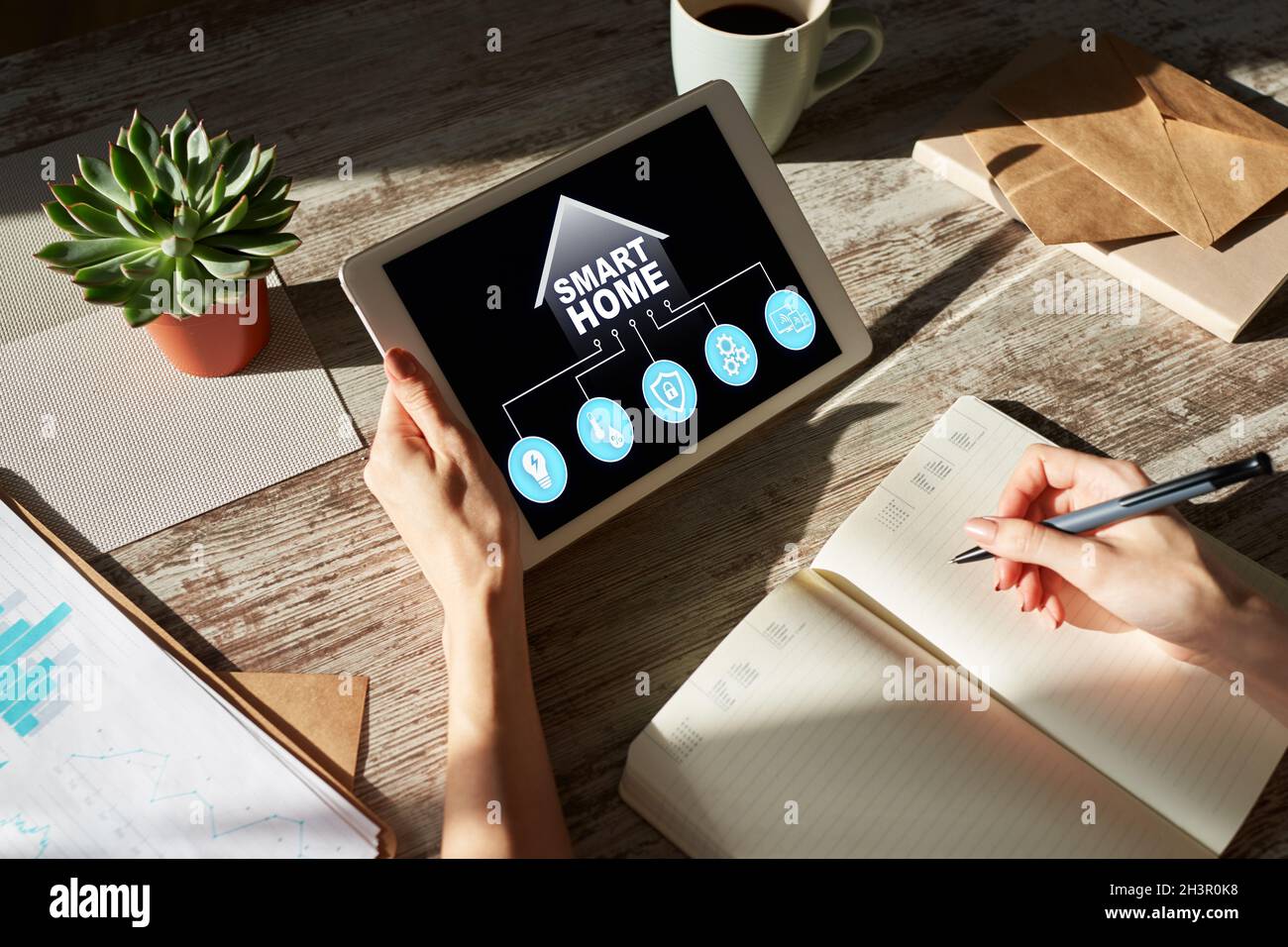 Smart home concept, control panel software on device screen. Stock Photo